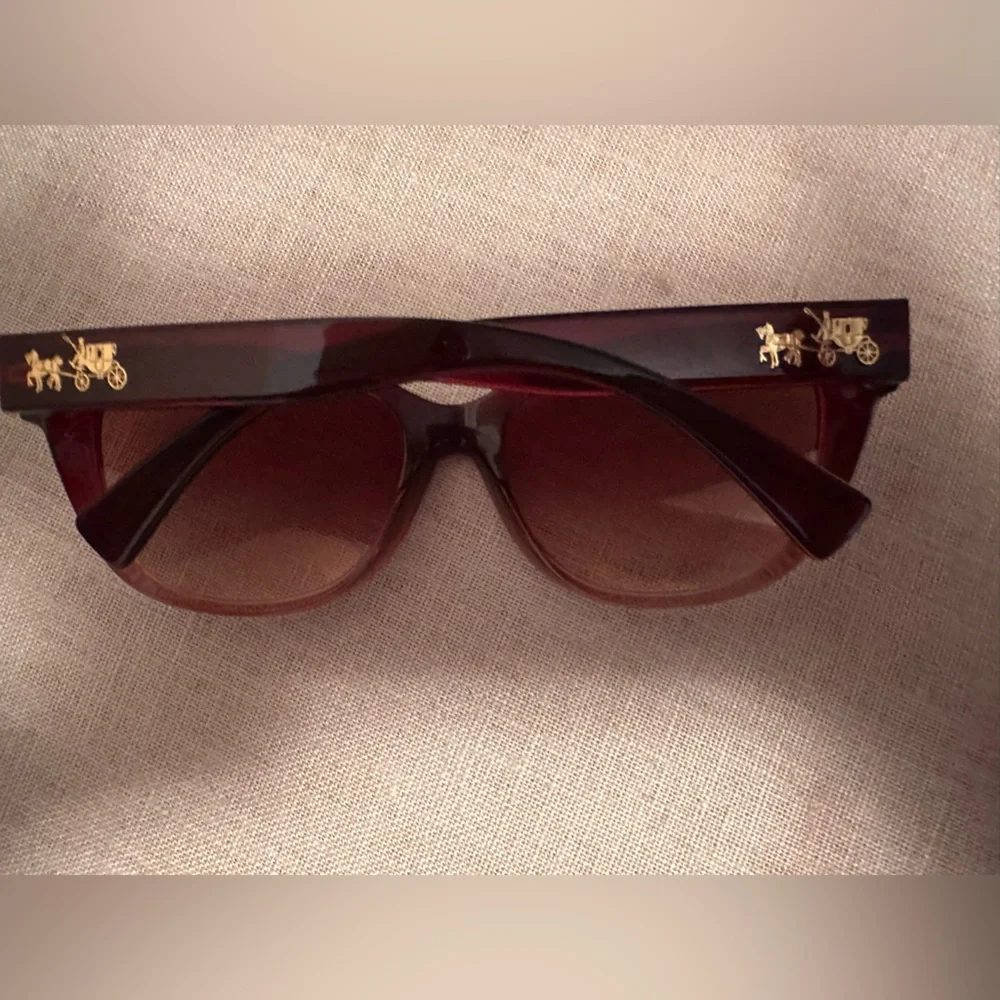 Red Coach sunglasses with horse and carriage logo on the side - Picture 3 of 5
